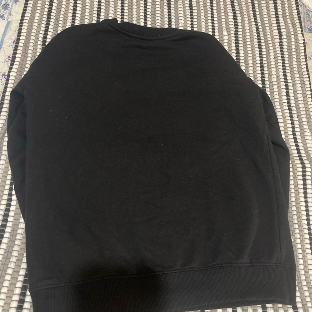 A very comfortable and warm black sweatshirt!